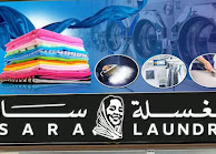 Sara Laundry signage showing folded laundry and pressing services